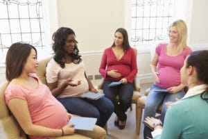 Pregnant women in a MAdriella small childbirth education class
